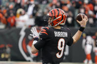 Cincinnati Bengals quarterback Joe Burrow throws before an NFL wild-card playoff football game between the Cincinnati Bengals and the Las Vegas Raiders, Saturday, Jan. 15, 2022, in Cincinnati. (AP Photo/Jeff Dean)