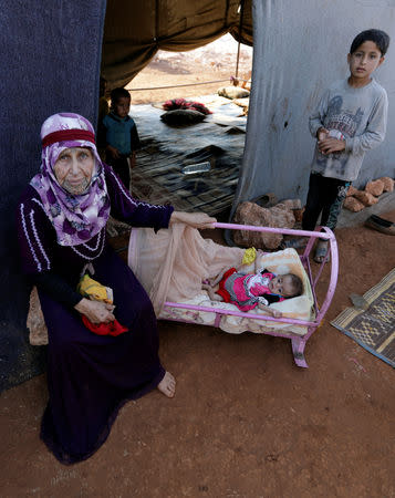 Newly displaced Syrians are pictured after their arrival to a refugee camp in Atimah village, Idlib province, Syria September 11, 2018. REUTERS/ Khalil Ashawi