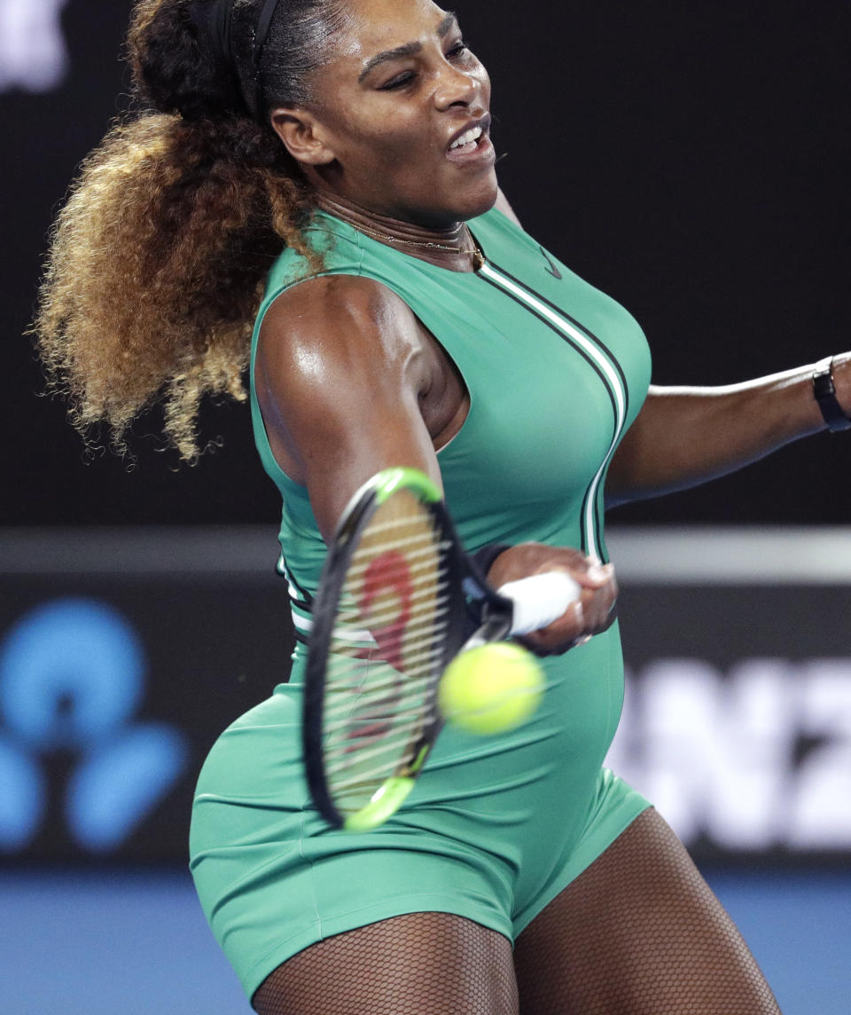 United States' Serena Williams hits a forehand return to Canada's Eugenie Bouchard during their second round match at the Australian Open tennis championships in Melbourne, Australia, Thursday, Jan. 17, 2019. (AP Photo/Aaron Favila)