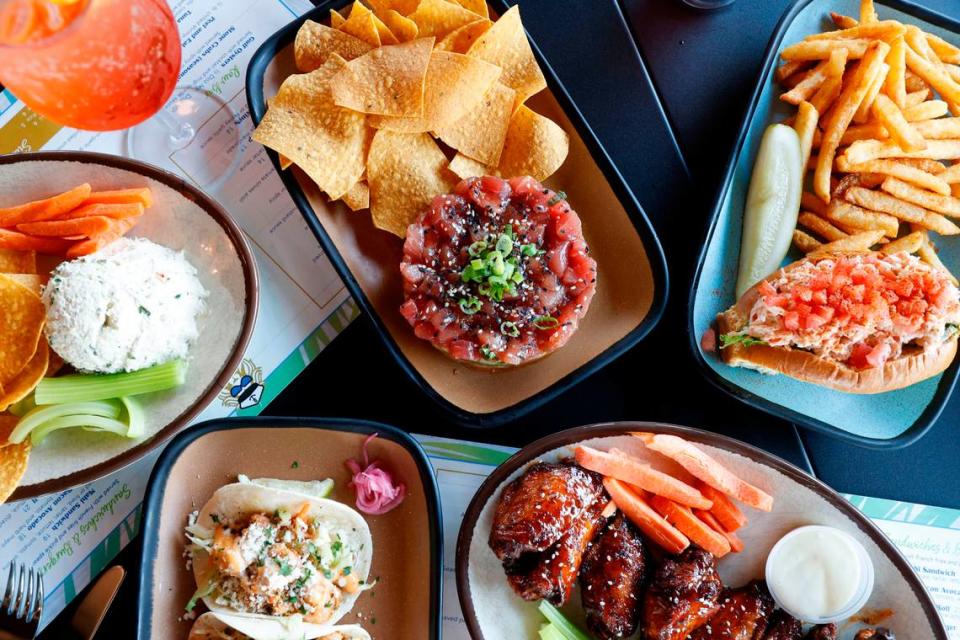 The menu at Oceanside Safari includes fish tacos, fish dip, tuna tartare and more.