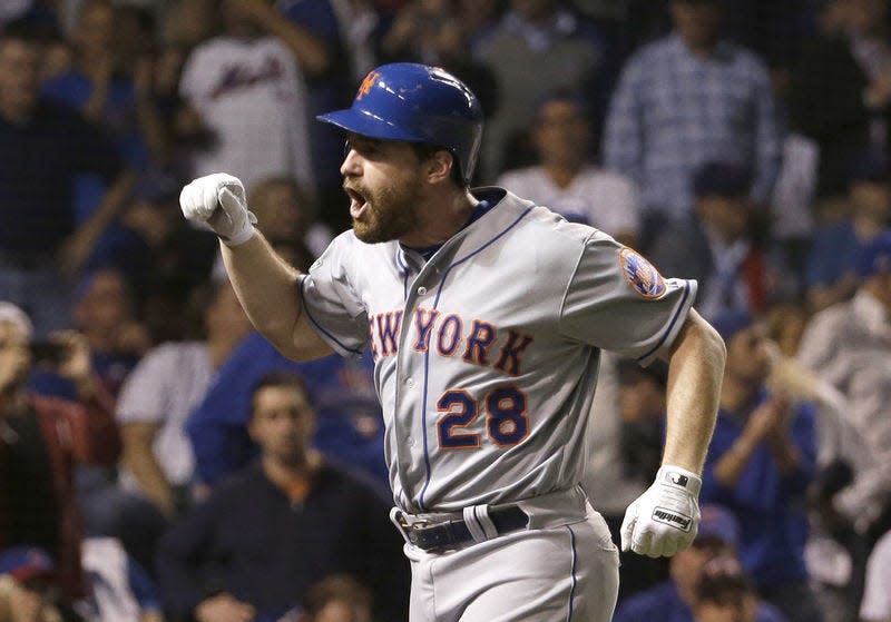Daniel Murphy celebrates after hitting a home run for the Mets in the 2015 NLCS, part of a record-setting homer streak that earned series MVP honors. The Jacksonville native is coming out of retirement with baseball's independent Long Island Ducks. [David J. Phillip/AP Photo File]