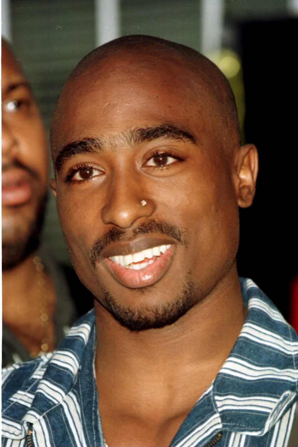 Rapper Tupac Shakur smiling