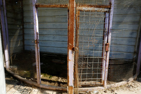 A cage of an animal is seen at Nour Park in Mosul's zoo, Iraq, February 2, 2017. REUTERS/Muhammad Hamed