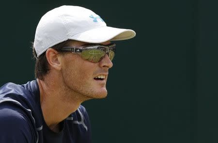 Tennis - Great Britain v France - Davis Cup World Group Quarter Final - Queen?s Club, London - 18/7/15 The court is reflected in the sunglasses of Great Britain's Jamie Murray during his doubles match Action Images via Reuters / Andrew Boyers Livepic