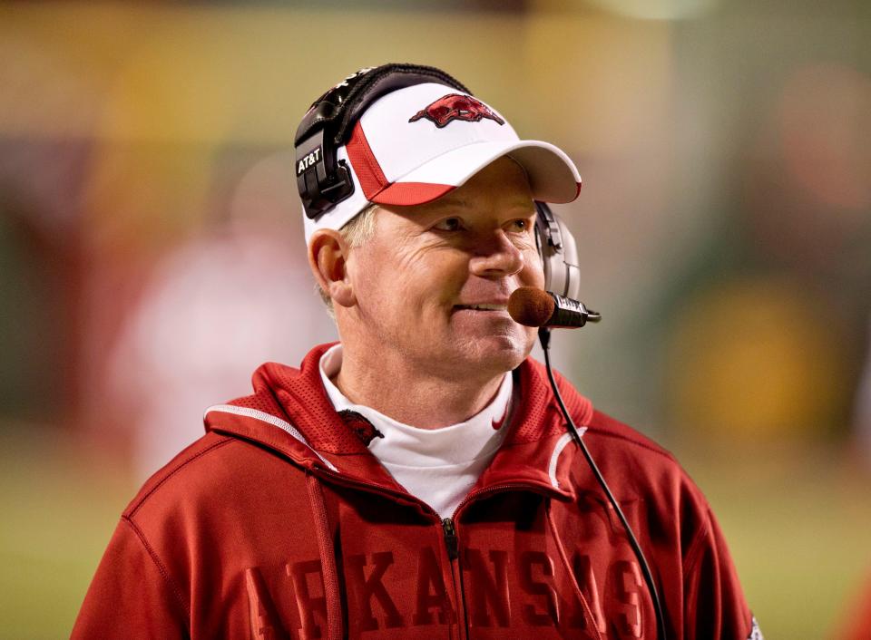 Nov 12, 2011; Fayetteville, AR, USA; Arkansas Razorbacks head coach Bobby Petrino walks down the sidelines during the second half of a game against the Tennessee Volunteers at Donald W. Reynolds Razorback Stadium. Mandatory Credit: Beth Hall-USA TODAY Sports