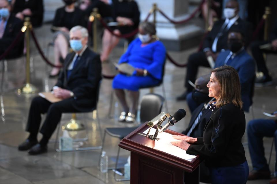 <p>House Speaker Nancy Pelosi spoke at the beginning of the memorial service. "John was revered and beloved on both sides of the aisle...God truly blessed America with the life and leadership of John Lewis," <a href="https://abcnews.go.com/Politics/procession-begins-late-rep-john-lewis-lies-state/story?id=71999770" rel="nofollow noopener" target="_blank" data-ylk="slk:said;elm:context_link;itc:0;sec:content-canvas" class="link ">said</a> Pelosi. </p>