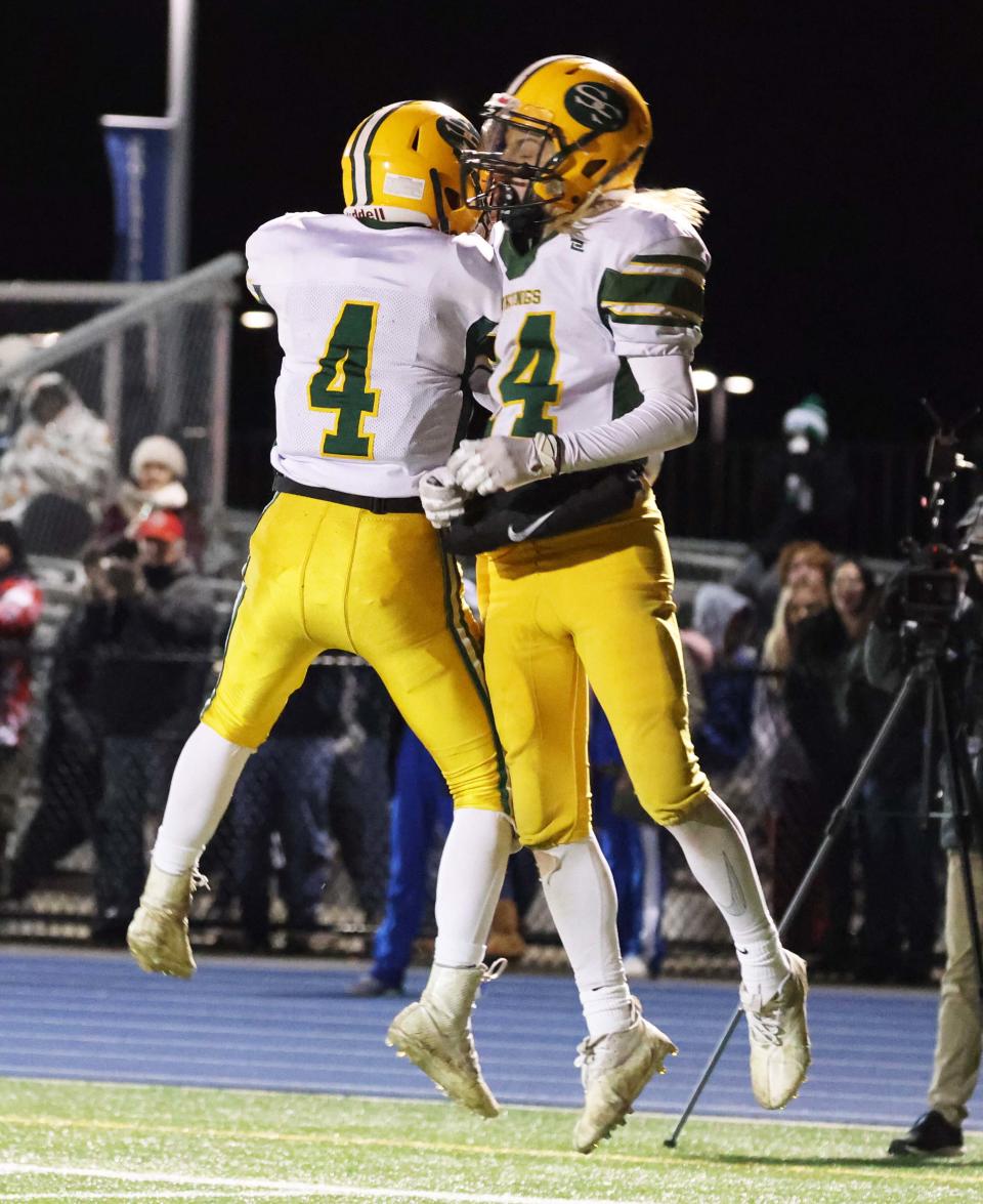 South Shore wide receiver Todd Egan, right, makes the touchdown catch and is congratulated by Tyler Richards, during a game versus Holbrook/Avon on Wednesday, Nov. 24, 2021. 