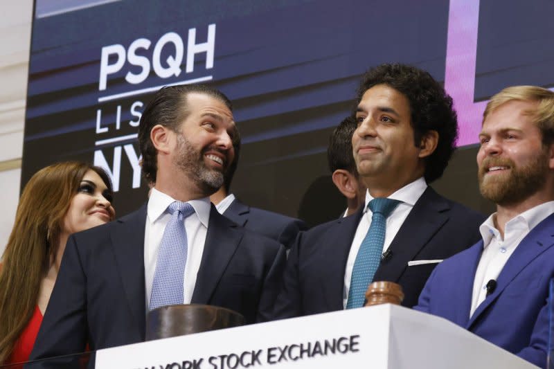 PublicSq Founder and CEO Michael Seifert (R) appears with Colombier Acquisition Corp. Chairman and CEO Omeed Malik, as well as Donald Trump Jr. and Kimberly Guilfoyle (both at L) ring the opening bell at the New York Stock Exchange on Wall Street in New York City on Thursday. Photo by John Angelillo/UPI