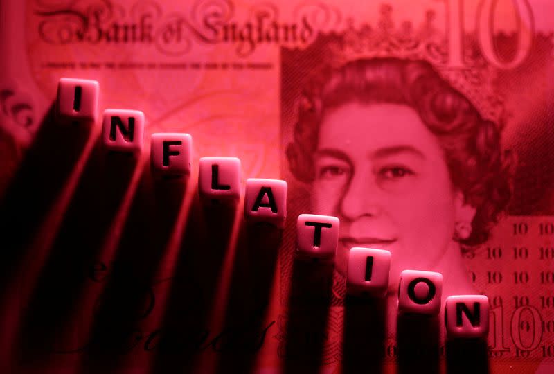 FILE PHOTO: Illustration shows plastic letters arranged to read "Inflation" are placed on British Pound banknote