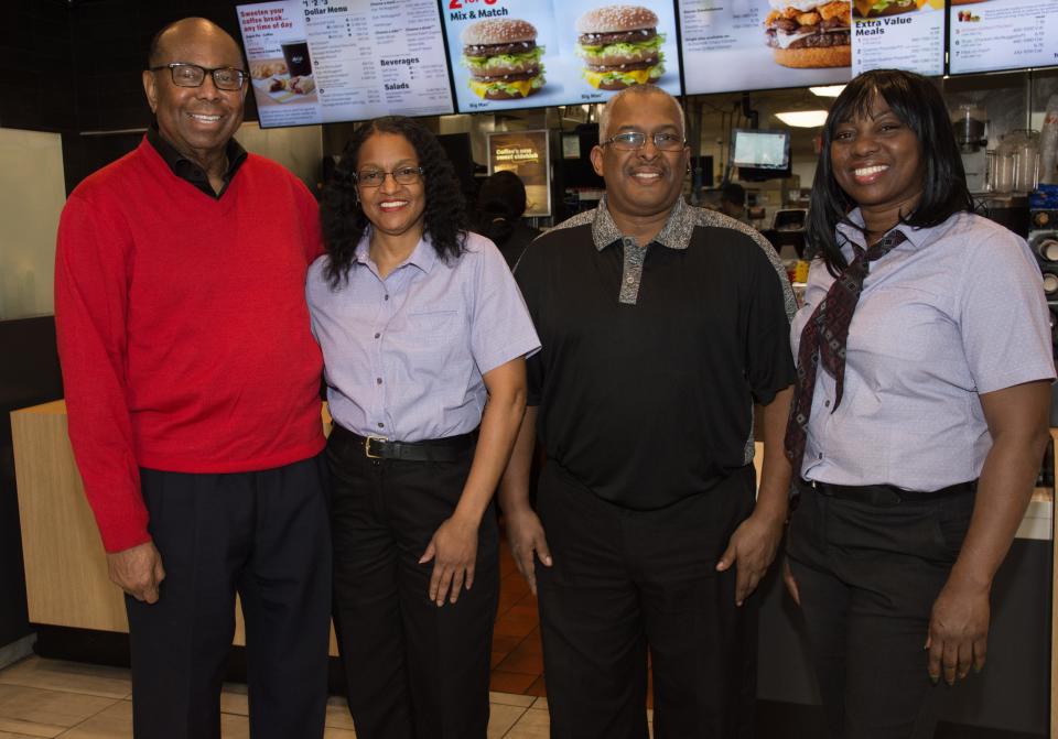 William "Doc" Pickard, left, Maurene Smith, Terry Belser, and Phyllis Buckle. Pickard had just sold the McDonald's franchise to Smith in 2022.