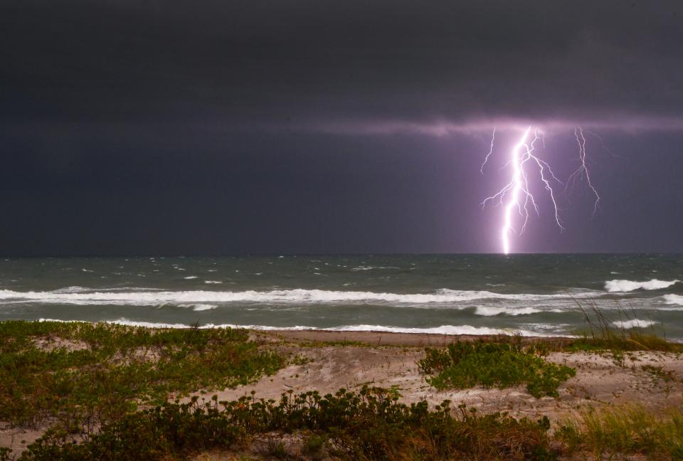 A storm cell moved over the ocean bringing a dangerous light show Thursday evening. Photo: Malcolm Denemark/FLORIDA TODAY