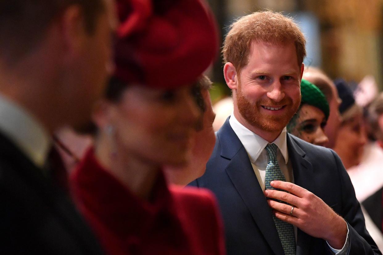 Britain's Prince Harry, Duke of Sussex (C) is introduced to performers as he leaves with Britain's Prince William, Duke of Cambridge (L) and Britain's Catherine, Duchess of Cambridge (2L) after attending  the annual Commonwealth Service at Westminster Abbey in London on March 09, 2020. - Britain's Queen Elizabeth II has been the Head of the Commonwealth throughout her reign. Organised by the Royal Commonwealth Society, the Service is the largest annual inter-faith gathering in the United Kingdom. (Photo by Ben STANSALL / POOL / AFP) (Photo by BEN STANSALL/POOL/AFP via Getty Images)