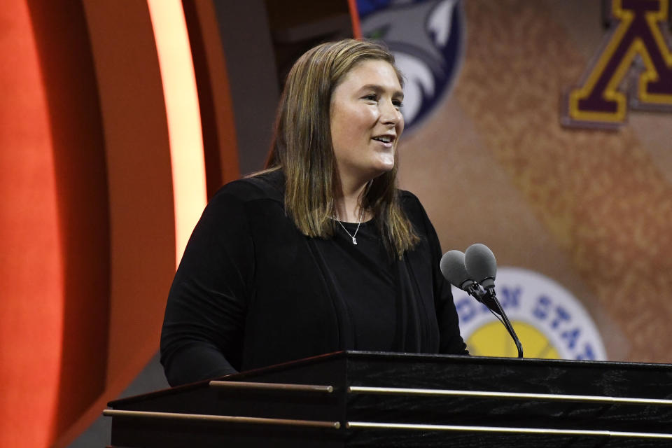 Lindsay Whalen addresses a gathering during her enshrinement ceremony for the Basketball Hall of Fame, Saturday, Sept. 10, 2022, in Springfield, Mass. (AP Photo/Jessica Hill)