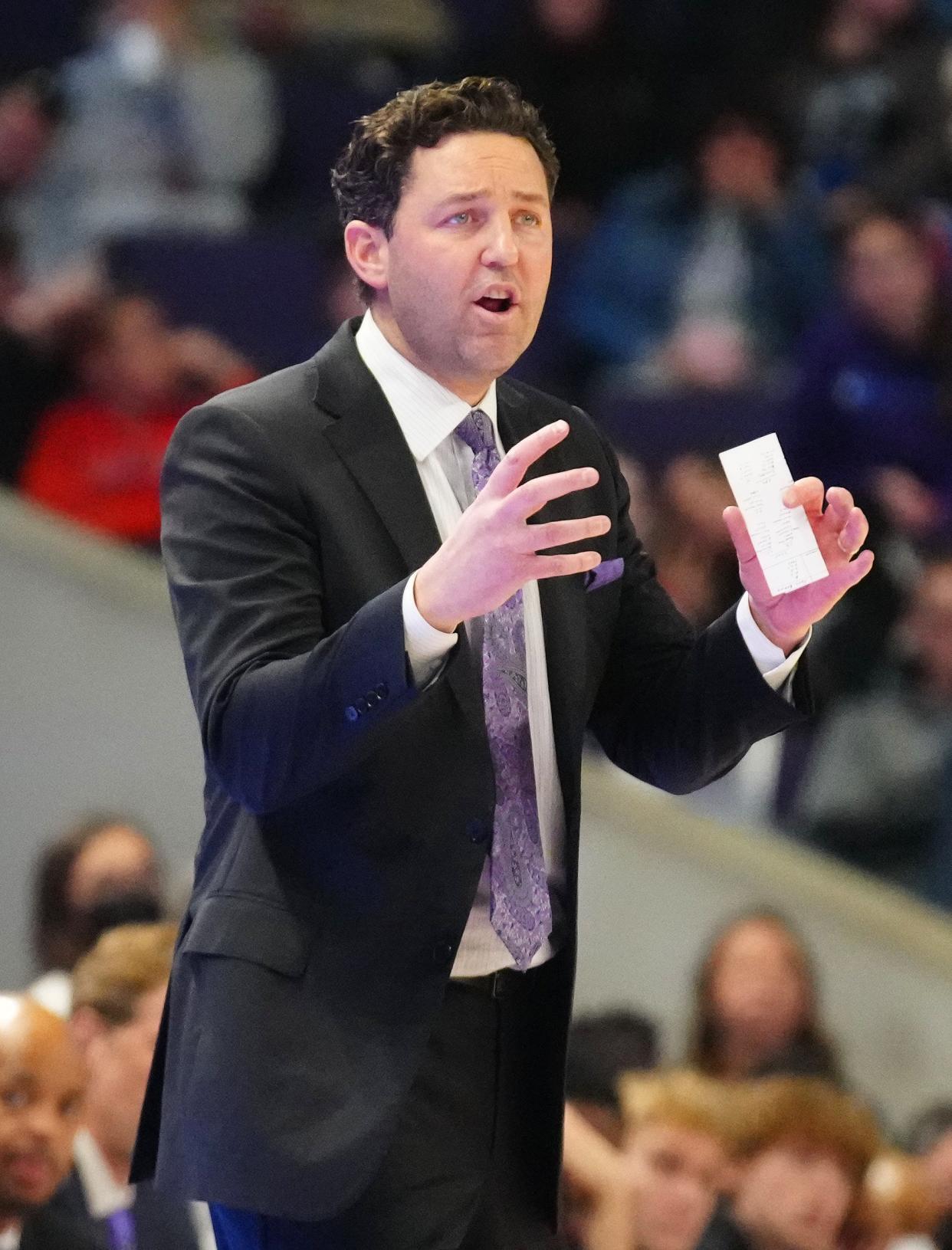 Dec 30, 2021; Phoenix, AZ, United States; GCU's head coach Bryce Drew talks with his team during a game against Chicago State at GCU.