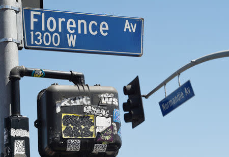 A view of the streets signs in the intersection of Florence and Normandie Avenue, the flashpoint where the riots started 25 years ago, in Los Angeles, California, U.S., April 29, 2017. REUTERS/Kevork Djansezian