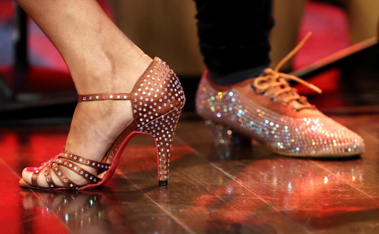 Sparkly shoes on stage.