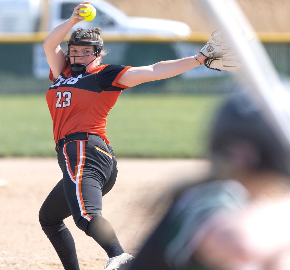 Marlington pitcher Sofia Nase winds up to deliver a pitch against Aurora during the Division II district final, Thursday, May 18, 2023, in Jefferson.