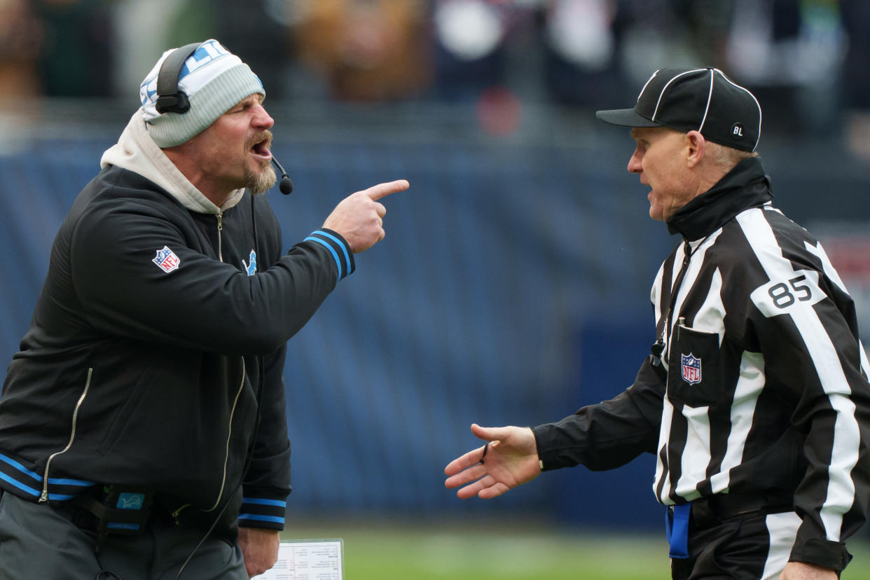 CHICAGO, IL - DECEMBER 10: head coach Dan Campbell of the Detroit Lions argues with line judge Daniel Gallagher #85 during an NFL football game against the Chicago Bears at Soldier Field on December 10, 2023 in Chicago, Illinois. The Bears beat the Lions 28-13. (Photo by Todd Rosenberg/Getty Images)