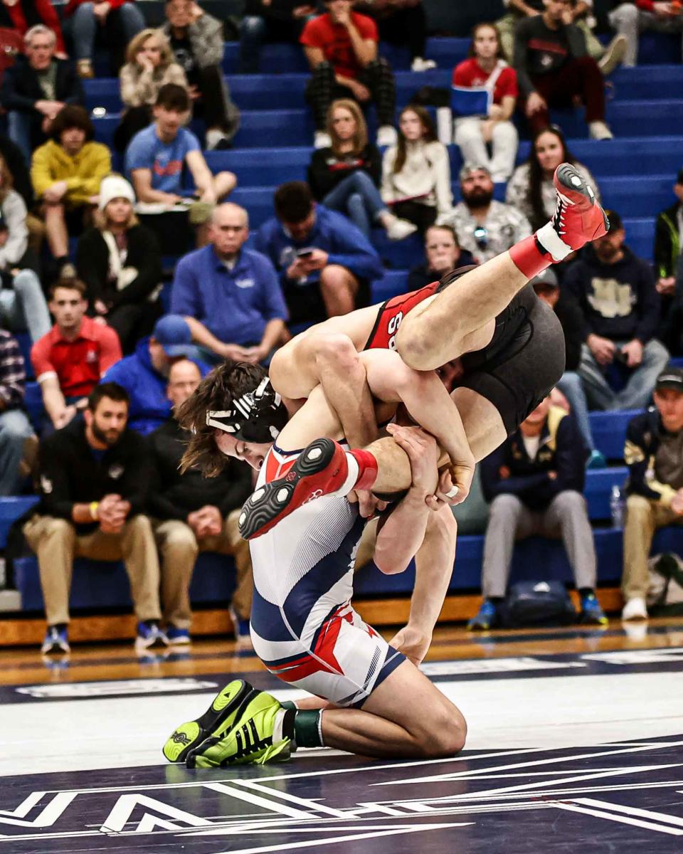 Griffin Gonzalez (L) takes down Andrew McClune (W) during the 152 lb match. Gonzalez (L) won due to injury at the 4:50 mark for his fourth LL tournament title. The two-day LL League wrestling championships concluded Saturday, Jan. 28, 2023 at Manheim Township.