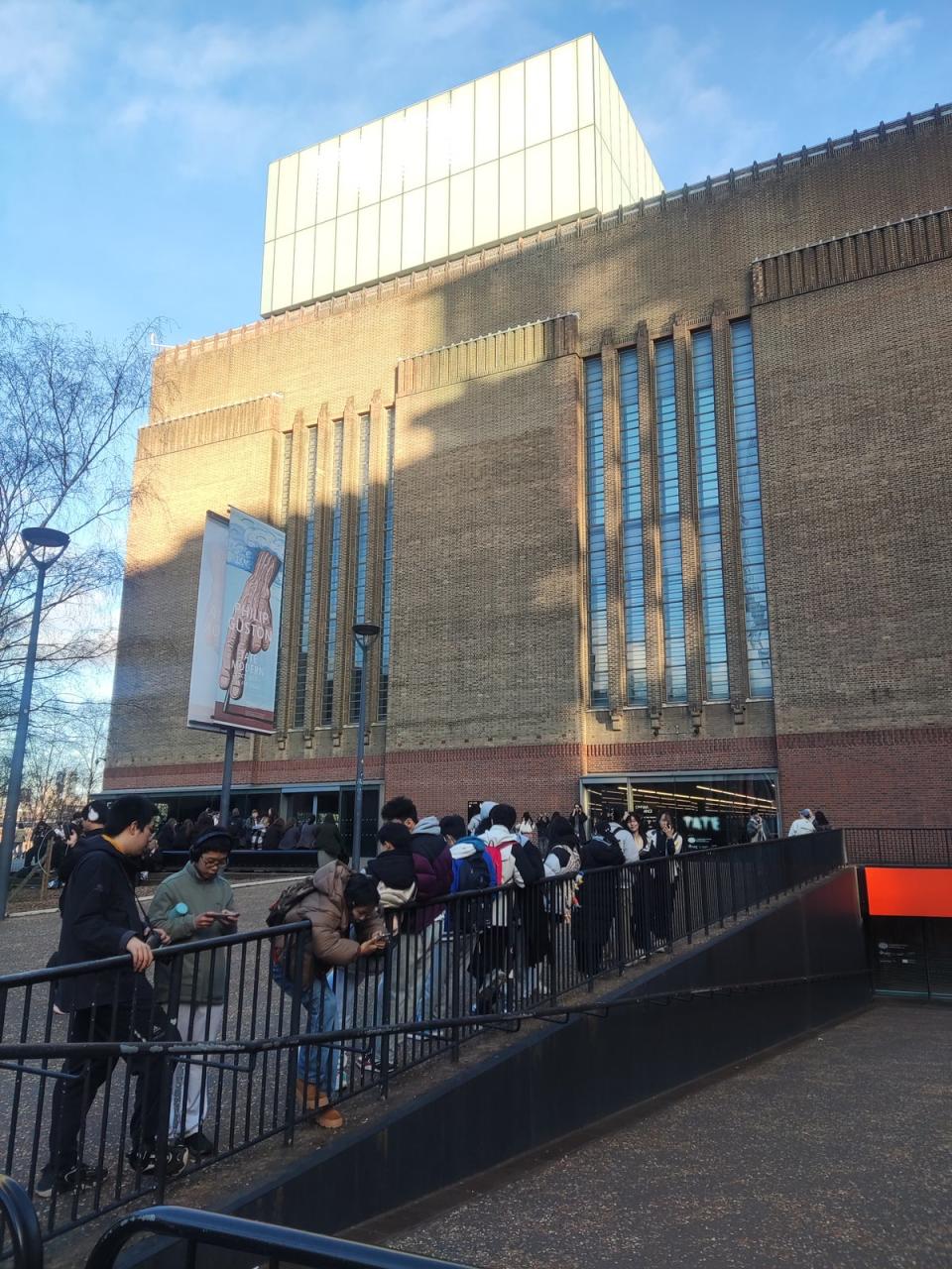 Crowds gathered outside the gallery on Friday after the museum was evacuated (The Independent)