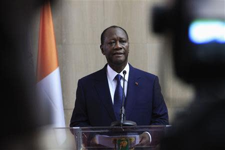 Ivory Coast's President Alassane Ouattara gives a news conference as he arrives at Felix Houphouet-Boigny international airport in Abidjan March 2, 2014. REUTERS/Thierry Gouegnon