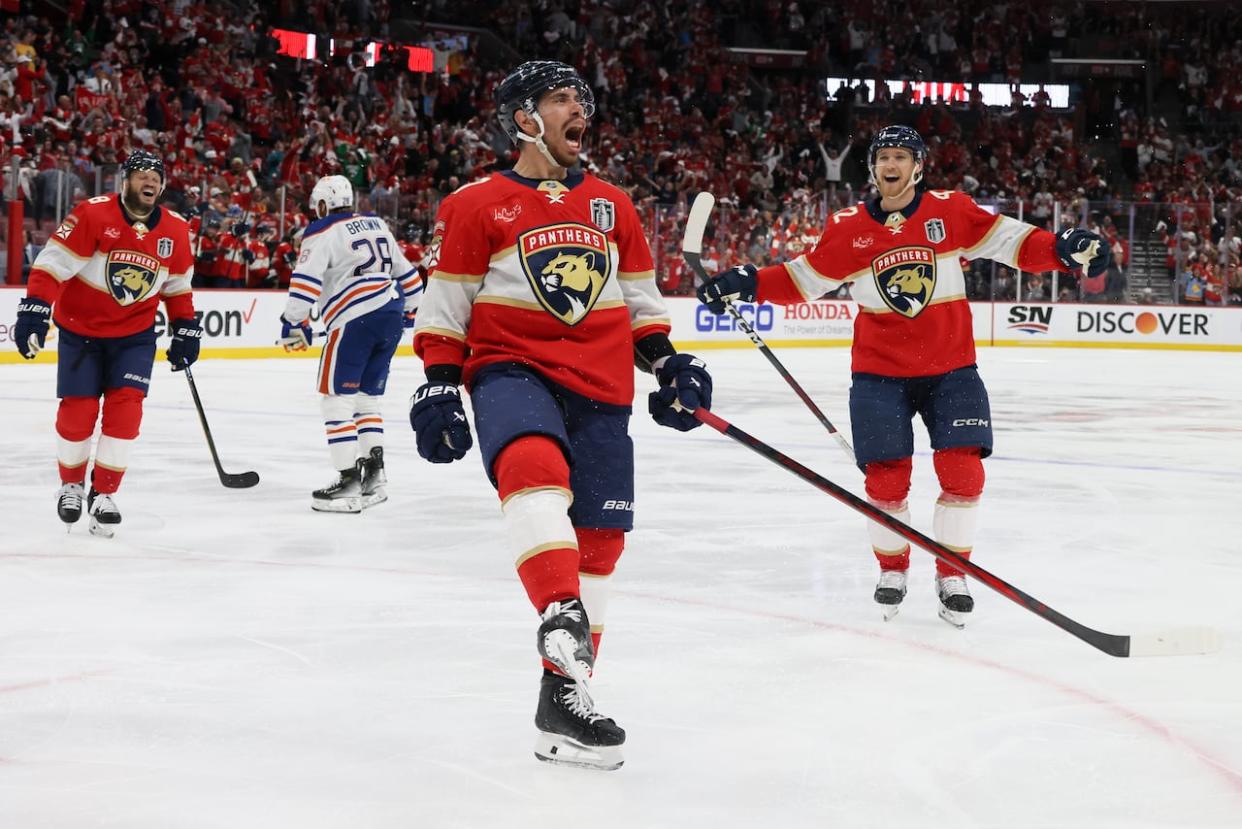 Panthers forward Evan Rodrigues celebrates his go-ahead goal against the Oilers during the third period in Game 2 of the Stanley Cup final on Monday night at Amerant Bank Arena in Sunrise, Fla. (Bruce Bennett/Getty Images - image credit)