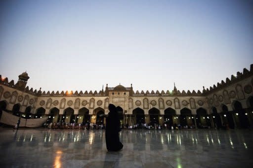 A woman walks through the al-Azhar mosque, in Cairo's Islamic neighbourhood. A television series depicting a revered Islamic figure has caused a stir in the Arab world with thousands saying the show must be stopped because they believe such depictions are forbidden by Islam