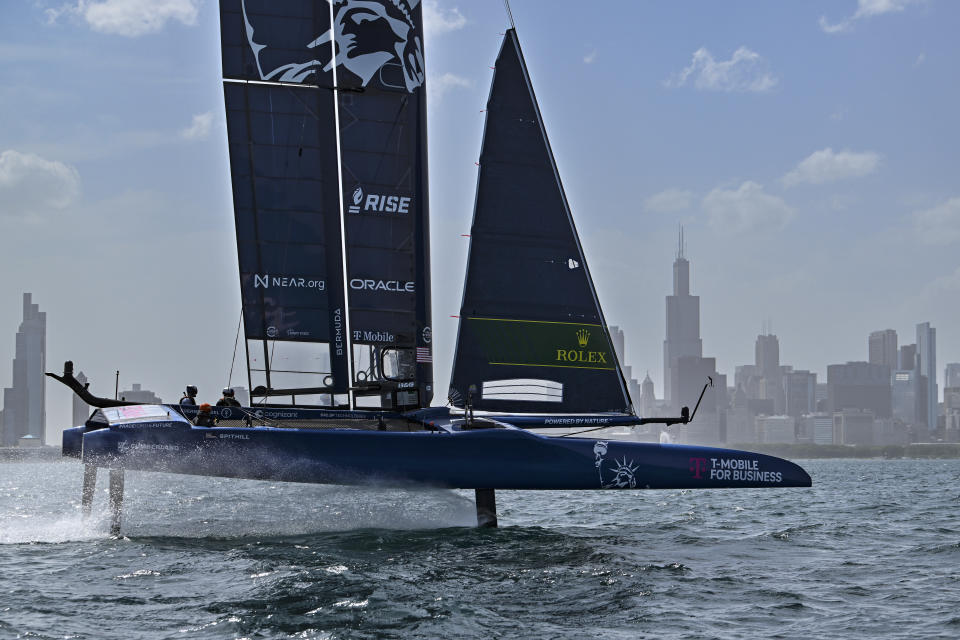USA SailGP Team, helmed by Jimmy Spithill, sail past the Chicago skyline ahead of this weekend's United States Sail Grand Prix sailing races, Wednesday June 15, 2022. (Ricardo Pinto/SailGP via AP)