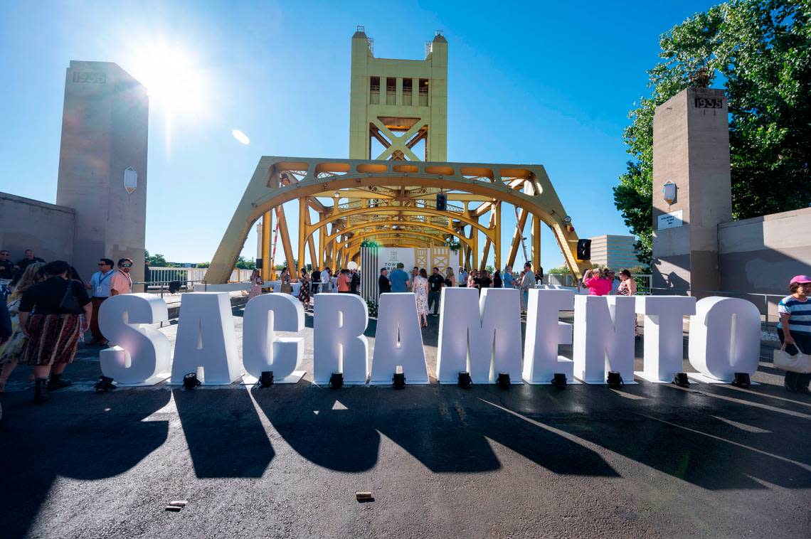 A Sacramento sign leads guests to the Farm-to-Fork Festival’s Tower Bridge Dinner on Sunday.