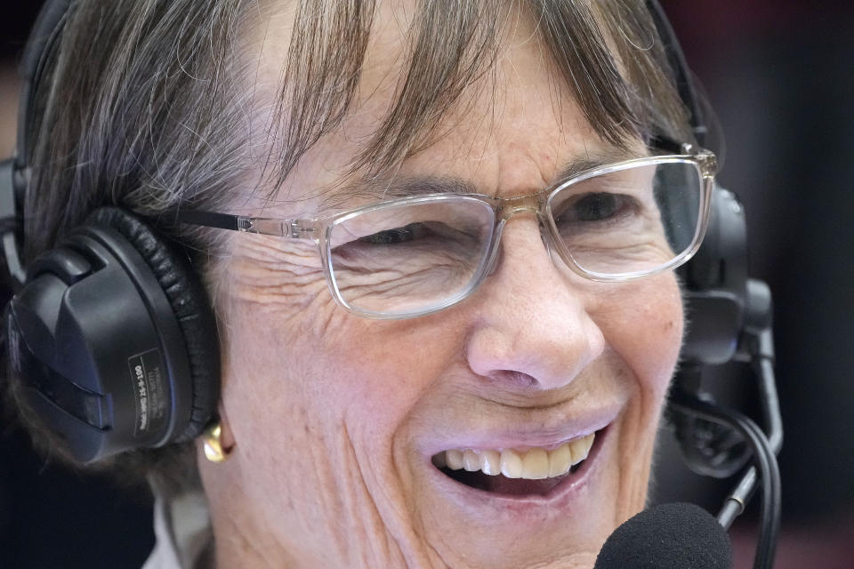 Stanford coach Tara VanDerveer smiles as she is interviewed after her 1,202nd victory as a college coach, against Oregon in an NCAA basketball game Friday, Jan. 19, 2024, in Stanford, Calif. VanDerveer tied former Duke men's basketball coach Mike Krzyzewski for the most wins. (AP Photo/Tony Avelar)