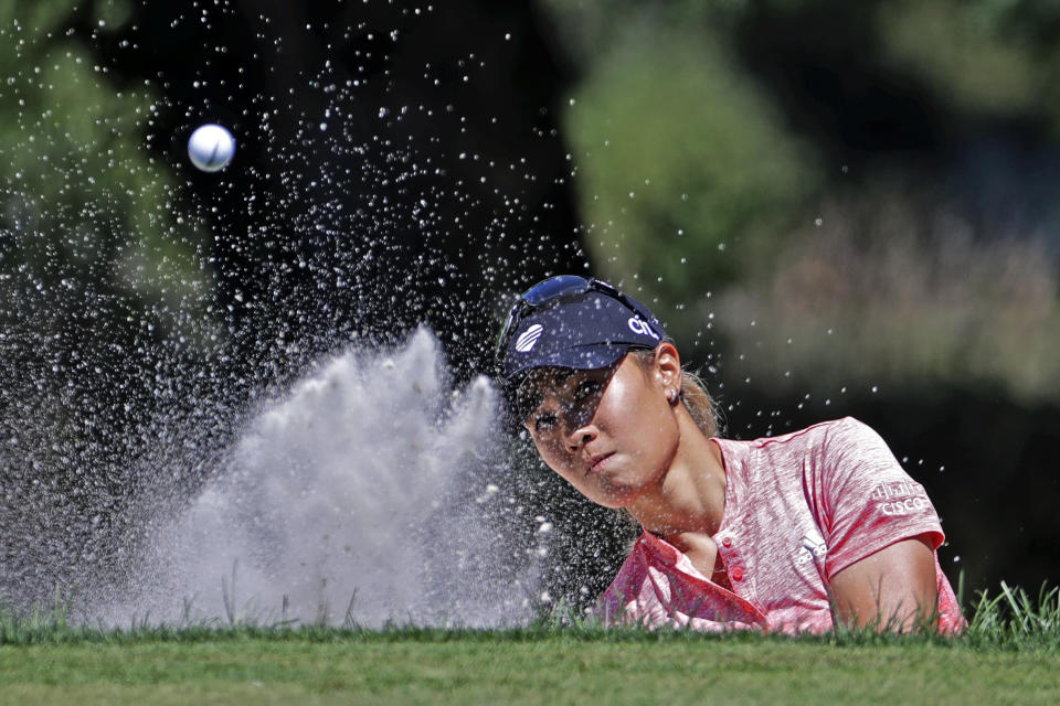 Danielle Kang hits out of a green side bunker on the first hole during the third round of the Marathon Classic LPGA golf tournament Saturday, Aug. 8, 2020, at the Highland Meadows Golf Club in Sylvania, Ohio. (AP Photo/Gene J. Puskar)