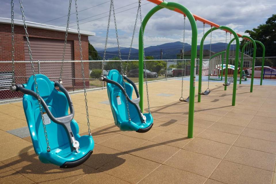 Some of the swings at the inclusive playground at Silver Beach Elementary School have supportive backs and secure straps so that differently-able children are able to use them. The new playground was completed on Aug. 28. 2023, in Bellingham, Wash. Rachel Showalter/The Bellingham Herald