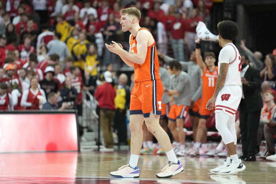 March 2, 2024; Madison, Wisconsin; Illinois Fighting Illini forward Marcus Domask (3) celebrates the Illinois Fighting Illini 91-83 win over the Wisconsin Badgers at the Kohl Center. Kayla Wolf-USA TODAY Sports