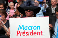 <p>A supporter of independent centrist presidential candidate Emmanuel Macron holds up a poster during a campaign rally in Paris, France, Monday, May 1st, 2017. With just six days until a French presidential vote that could define Europe’s future, far-right leader Marine Le Pen and centrist Emmanuel Macron are holding high-stakes rallies Monday. (AP Photo/Christophe Ena) </p>