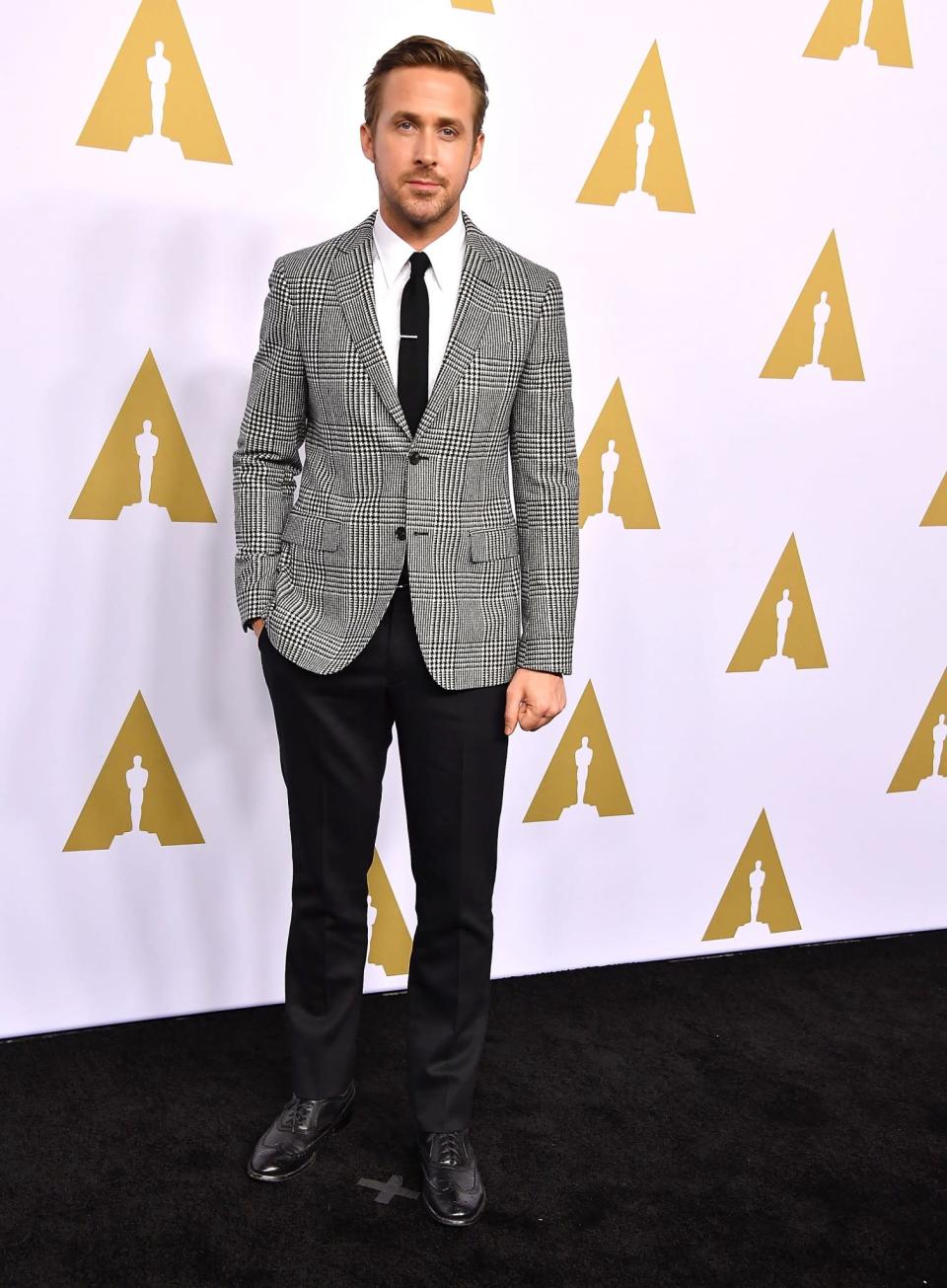 <p>The one and only Ryan Gosling looked very dapper, as per usual. Wearing a checked blazer by Salvatore Ferragamo. [Photo: Getty] </p>