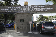 FILE - Soldiers check vehicles entering military headquarters Camp Aguinaldo in Manila, Philippines on Monday, March 22, 2021. State-sponsored Chinese hackers have been broadly targeting government and private sector organizations across Southeast Asia, including the Armed Forces of the Philippines and the Department of Foreign Affairs, according to a report released Wednesday by a U.S.-based private cybersecurity company. (AP Photo/Aaron Favila, File)