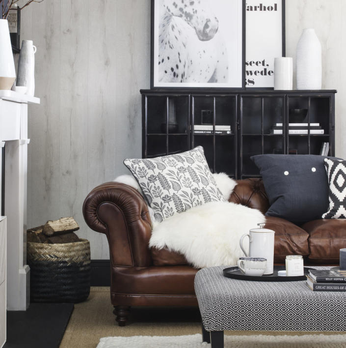 monochrome living room with leather sofa