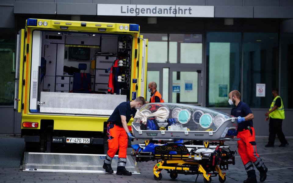 Mandatory Credit: Photo by CLEMENS BILAN/EPA-EFE/Shutterstock (10751900i) German Bundeswehr paramedics at the clinic after Russian opposition activist Alexei Navalny arrived at Charite clinic in Berlin, Germany, 22 August 2020. Navalny was first placed in an hospital in Omsk, Russia, after he felt bad on board of a plane on his way from Tomsk to Moscow. The flight was interrupted and after landing in Omsk Navalny was delivered to hospital with a suspicion on a toxic poisoning. The hospital management agreed on 21 August 2020 to transport Navalny to a German hospital for further treatment. Russian opposition activist Alexei Navalny arrives in Germany after alleged poisoning, Berlin - 22 Aug 2020 - CLEMENS BILAN/EPA-EFE/Shutterstock