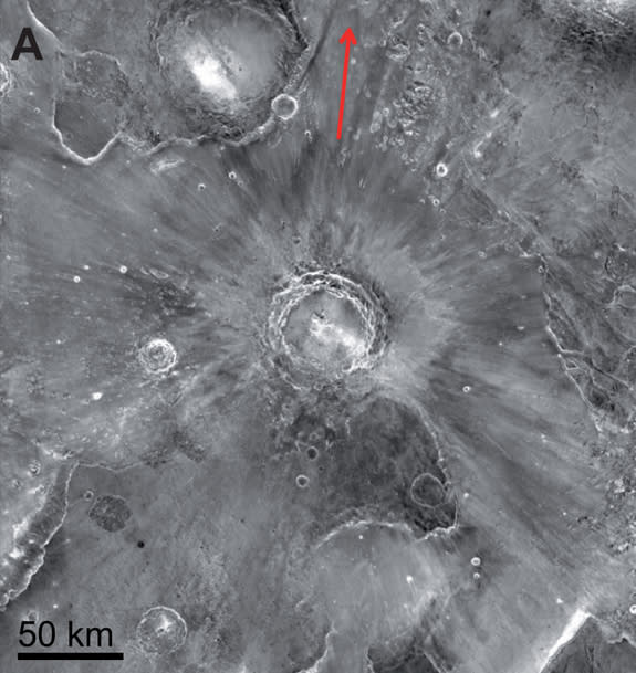 A look at Mojave Crater on Mars. The rays are evidence of debris thrown up from an impact that happened about five million years ago. The arrow points towards crater clusters used to estimate the age of the region.