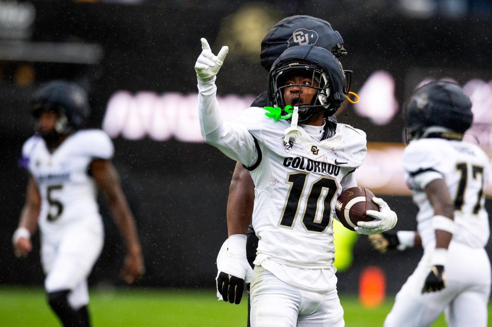 Colorado's LaJohntay Wester celebrates a first down during a Colorado football spring game at Folsom Field in Boulder on Saturday.