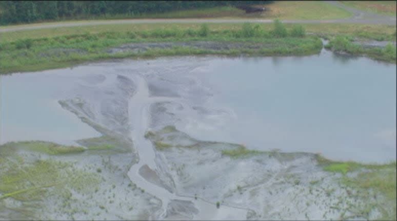 Ash from the spill traveled 70 miles downstream of the initial breach.