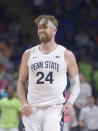 Penn State's Michael Henn reacts after hitting a long three point shot against Michigan during the first half of an NCAA college basketball game, Sunday, Jan. 29, 2023, in State College, Pa. (AP Photo/Gary M. Baranec)