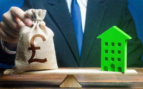 <span class="caption">Costs for achieving net zero are mounting, with no clear plan to afford them.</span> <span class="attribution"><a class="link " href="https://www.shutterstock.com/image-photo/businessman-puts-british-pound-sterling-money-2152256383" rel="nofollow noopener" target="_blank" data-ylk="slk:Shutterstock;elm:context_link;itc:0;sec:content-canvas">Shutterstock</a></span>