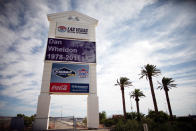 LAS VEGAS, NV - OCTOBER 17: A tribute to Dan Wheldon, driver of the #77 Dallara Honda, is displayed on a Las Vegas Motor Speedway sign on October 17, 2011 in Las Vegas, Nevada. Dan Wheldon, driver of the #77 Dallara Honda, was killed during the Las Vegas Indy 300 part of the IZOD IndyCar World Championships presented by Honda at Las Vegas Motor Speedway on October 16, 2011 in Las Vegas. (Photo by Tom Pennington/Getty Images)