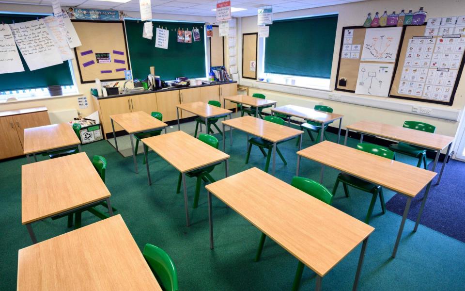 An empty classroom - OLI SCARFF/AFP