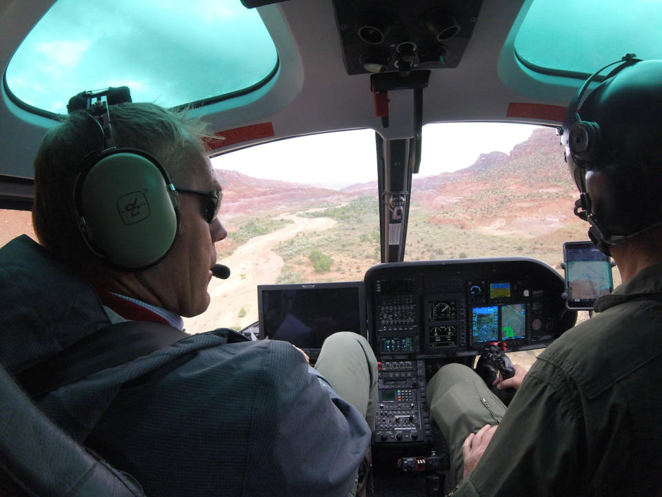 Zinke, left, looks out at the vast Grand Staircase-Escalante National Monument from the cockpit of a helicopter in May 2017. (Photo: Doi/Planet Pix via ZUMA Wire)