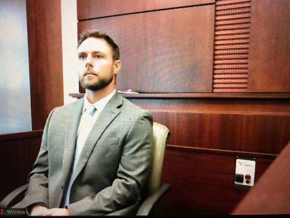 Travis Smith testifies in screen grab from Zoom
