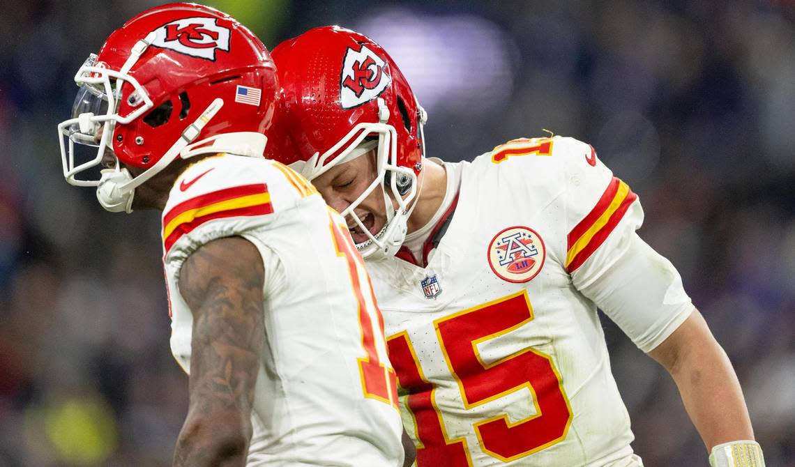 Kansas City Chiefs quarterback Patrick Mahomes (15) celebrates a first down reception with wide receiver Marquez Valdes-Scantling (11) during the AFC Championship Game against the Baltimore Ravens on Sunday, Jan. 28, 2024, in Baltimore.