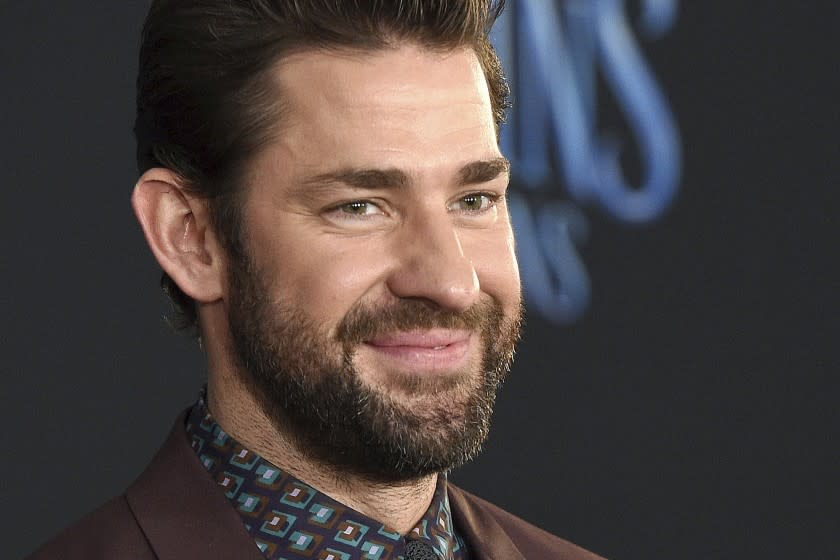 FILE - In this Nov. 29, 2018 file photo, actor-writer-director John Krasinski poses at the premiere of the film "Mary Poppins Returns" at the Dolby Theatre in Los Angeles. Krasinski and retired Boston Red Sox standout David Ortiz announced Sunday, April 12, 2020, during Krasinski's "Some Good News" YouTube show that workers at Beth Israel Deaconess Medical Center in Boston would be getting free Red Sox tickets. (Photo by Chris Pizzello/Invision/AP, File)