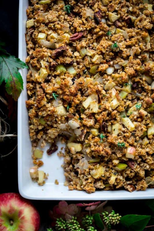 <p>Healthy Seasonal Recipes</p><p>A new-fangled twist on the retro stuffing we know and love. </p><p><strong>Get the recipe: </strong><a href="https://www.healthyseasonalrecipes.com/cornbread-stuffing-with-apples-and-pecans-with-a-gluten-free-option/" rel="nofollow noopener" target="_blank" data-ylk="slk:Cornbread Stuffing with Apples and Pecans;elm:context_link;itc:0;sec:content-canvas" class="link rapid-noclick-resp"><strong>Cornbread Stuffing with Apples and Pecans</strong></a></p>